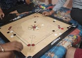 Students Playing Carrom